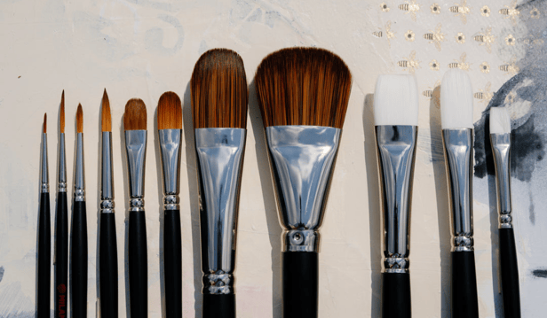 black handle paint brushes with brown bristles