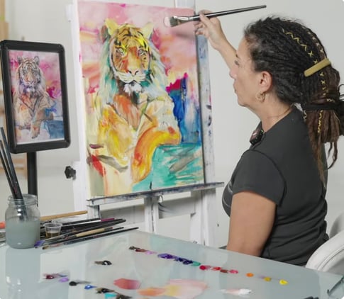 Woman Painting Tiger on canvas yellow blue teal