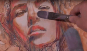 Women portrait wiht brush hovering infront of canvas orange and flesh tones