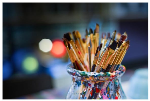 paintbrushes in jar