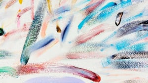 wipps of paint brush strokes mixed colors red teal yellow black