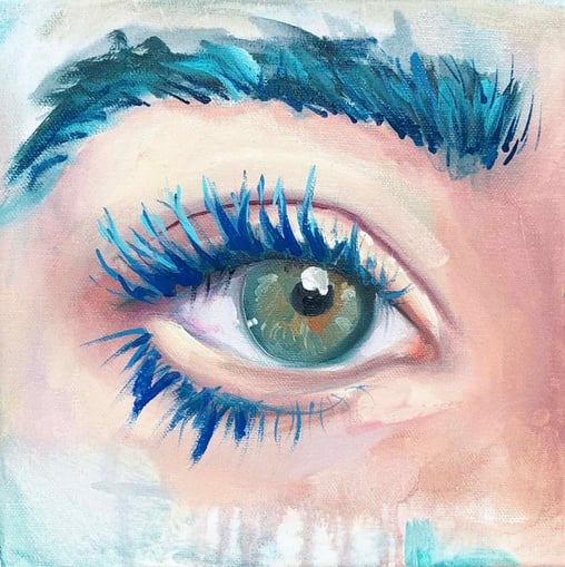 eye painting blue lashes with peach skin 