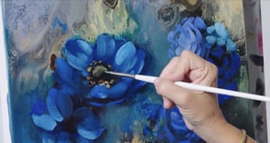 Hand painting with paintbrush blue flowers