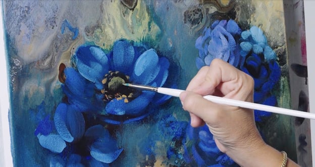 Hand painting on canvas blue flowers with tan green center