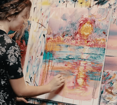 impressionism painting of ocean teal pink sky yellow sun