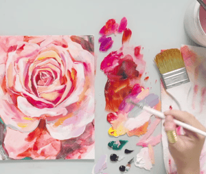 Floral pink paint with paintbrushes 