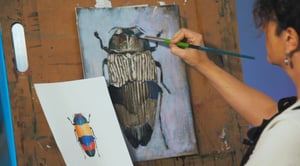 hand painting a Beatle 