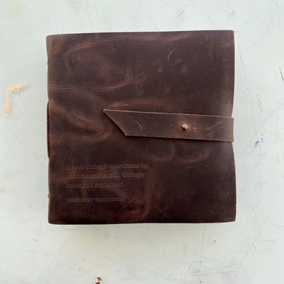 Leather brown square sketchbook with metal strapped button closure