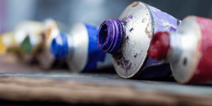 Acrylic paint tubes purple blue red