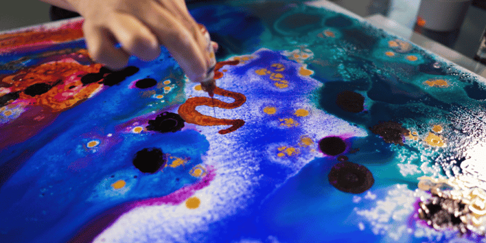 Ink painting with blue green and red paint