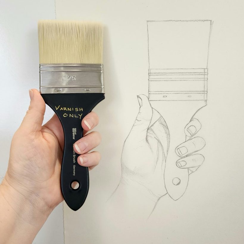A pencil contour drawing of a hand holding a paintbrush, the first challenge project