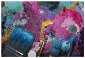 Messy painters palette blue purple yellow