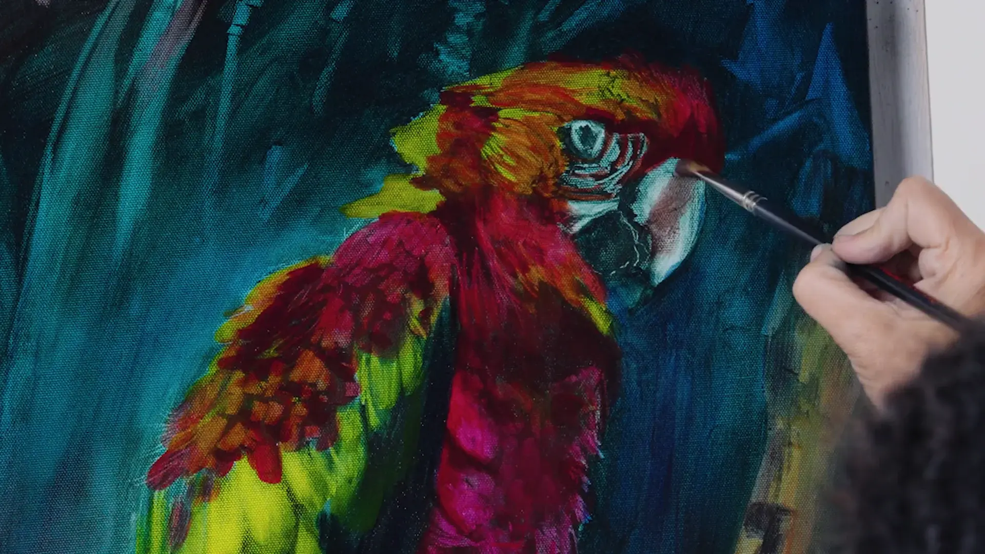Reds, magenta and yellow-green glazed over the parrot