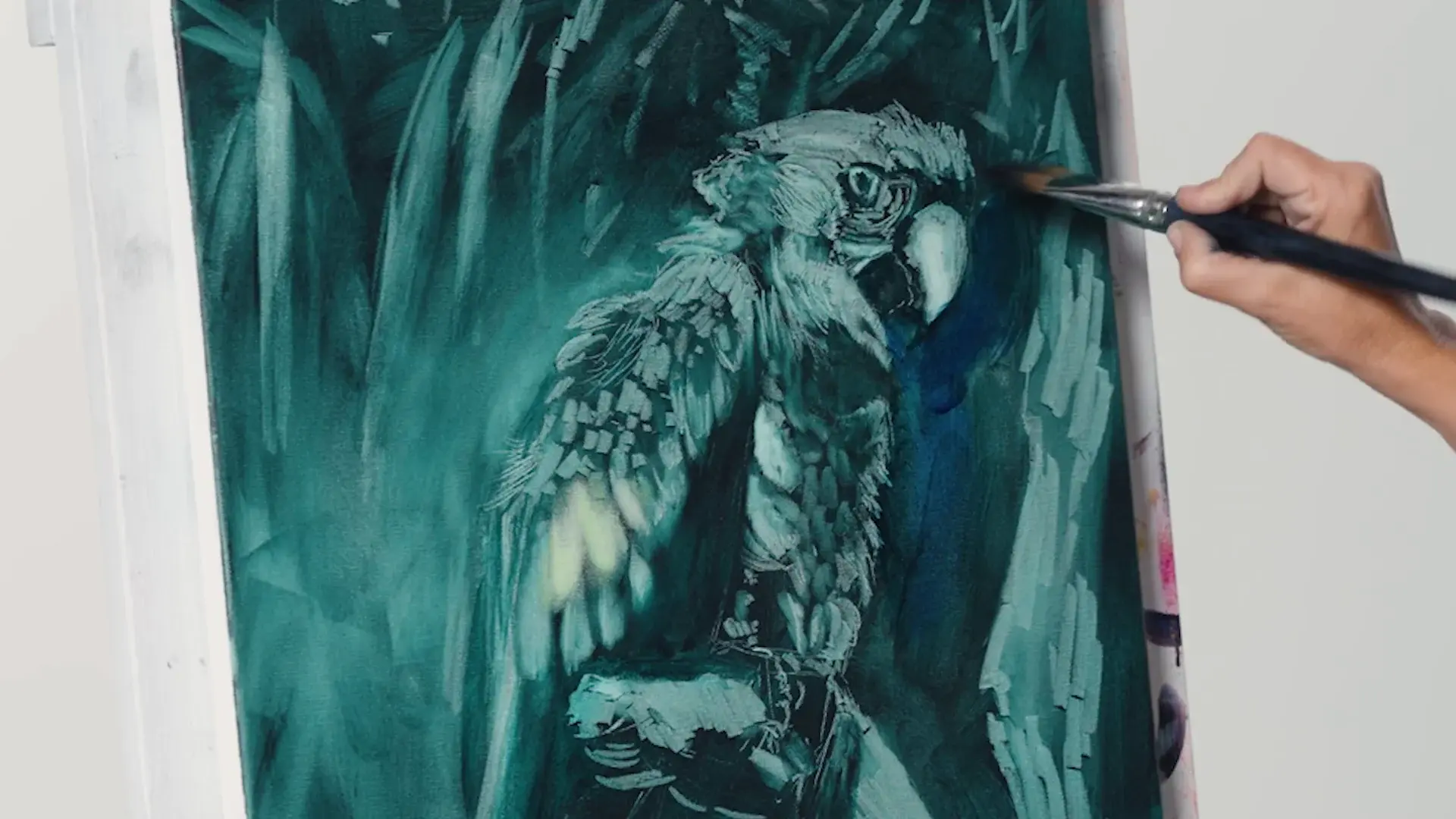The whole parrot in teal light and dark, the first layer finished