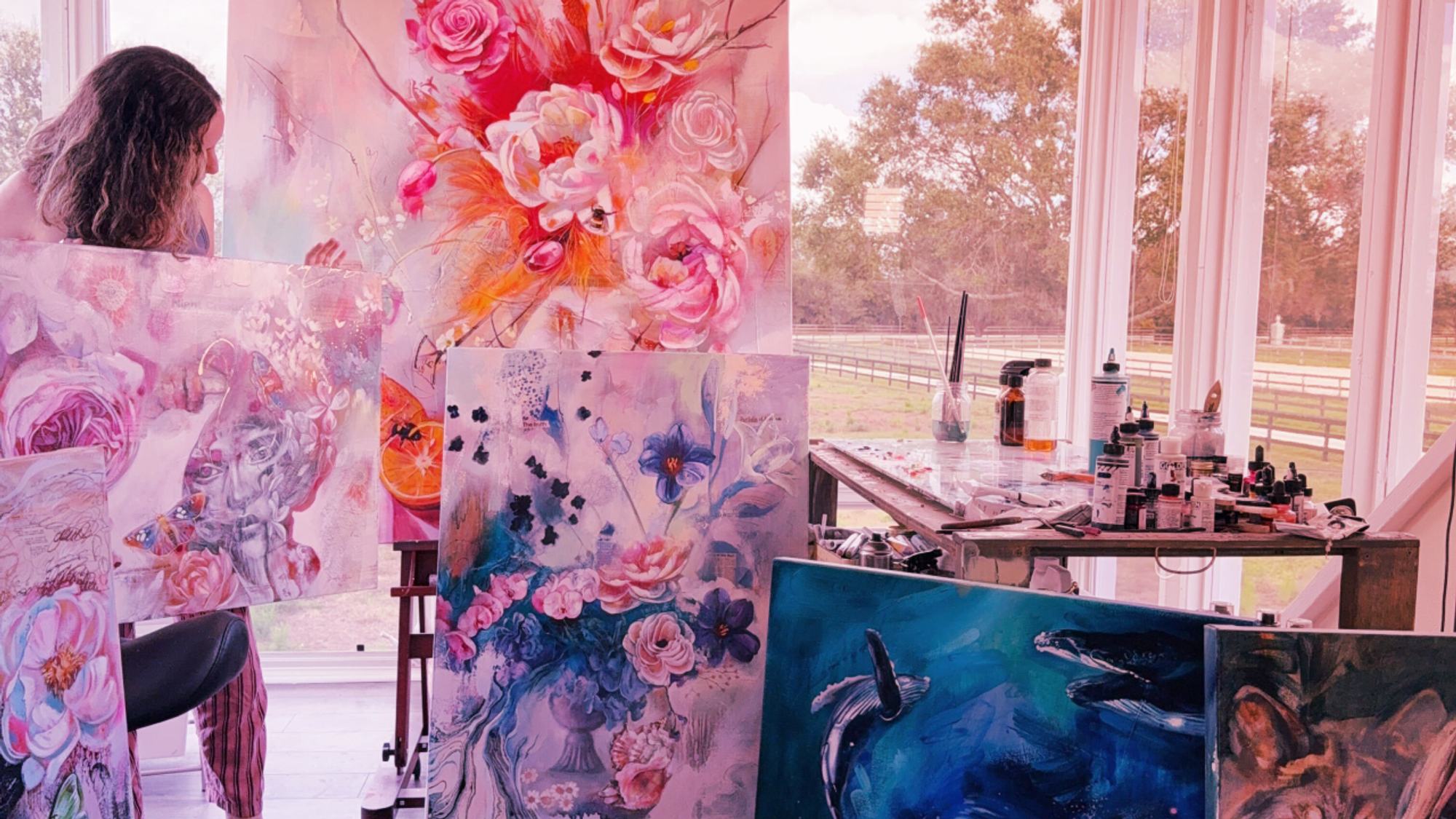 Room with bold color flower painting orange pink with blue underwater painting
