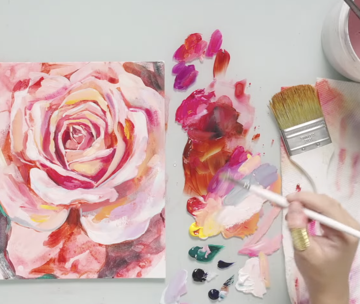 Floral pink paint with paintbrushes 