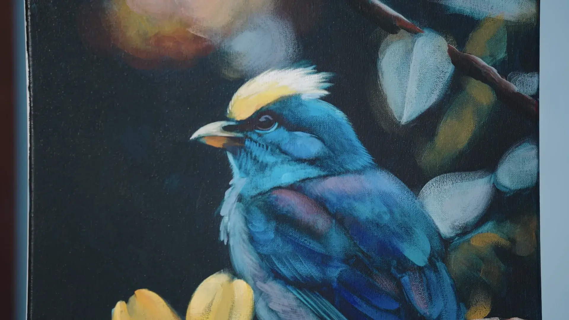 The finished acrylic blue bird with its yellow flower, from lesson 10