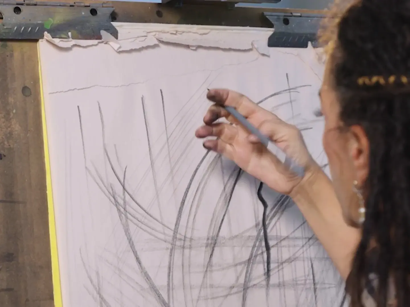 Long straight lines and ellipses drawn on a pad at the easel, from lesson 2
