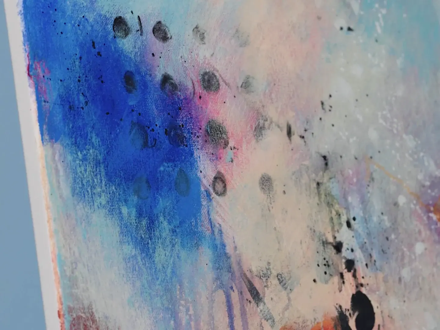 An abstract acrylic painting in blues, pinks and black dots, from lesson 7